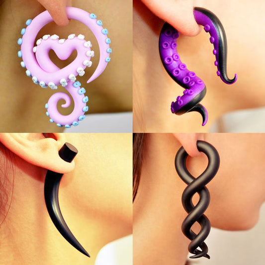 Earrings that look like gauges but aren't