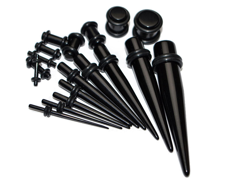 Black ear stretching kit for beginners from 14g to 00g — ear tapers (ear stretchers) and ear plugs. Smallest taper size: less than 18g to 14g at the thickest point. Black ear stretching kit beginners sizes: 14 gauge, 12 gauge, 10 gauge, 8 gauge, 6 gauge, 4 gauge, 3 gauge / 2 gauge, 0 gauge, 00 gauge / 000 gauge. Stretching kit with plugs for two ears (36ps) or for one ear (18ps).