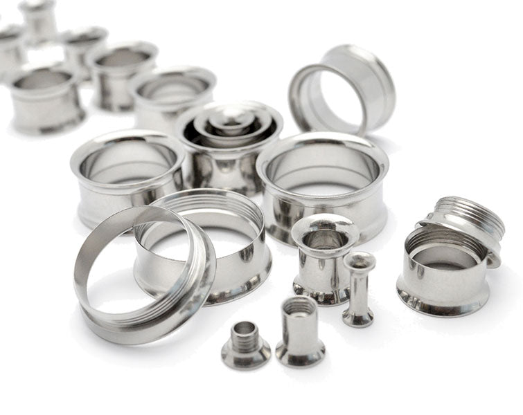 Screw back ear tunnels or screw fit double flare flesh tunnels - 1 pair. 316L stainless steel screw back tunnels in 8g (3mm), 6g (4mm), 4g (5mm), 2g (6mm), 0g (8mm), 00g (10mm), 1/2" (12mm), 9/16" (14mm), 5/8" (16mm), 11/16" (18mm), 3/4" (20mm), 7/8" (22mm), 1" (25mm)