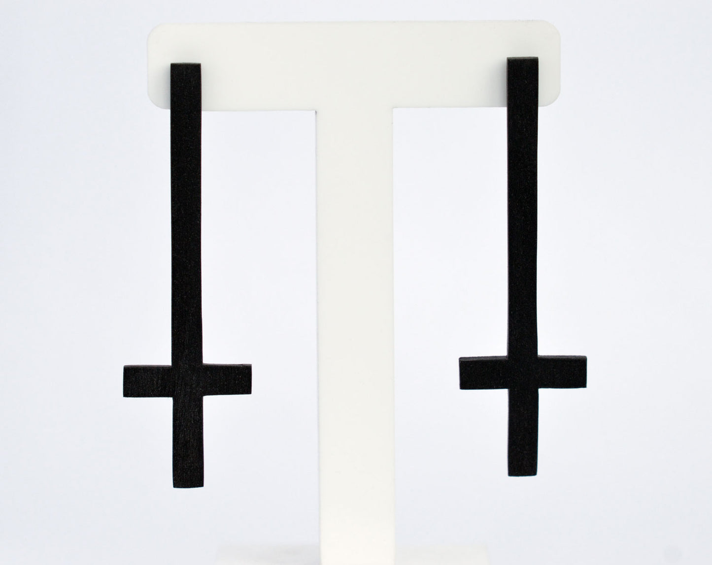Upside down cross earrings from Tania Chernova. Customizable colors, hypoallergenic, handmade inverted cross or black upside down cross earrings. Suitable for women and men, gold, pink or any color you like, hanging or dangle upside down cross earrings, nickel-free stud earrings.