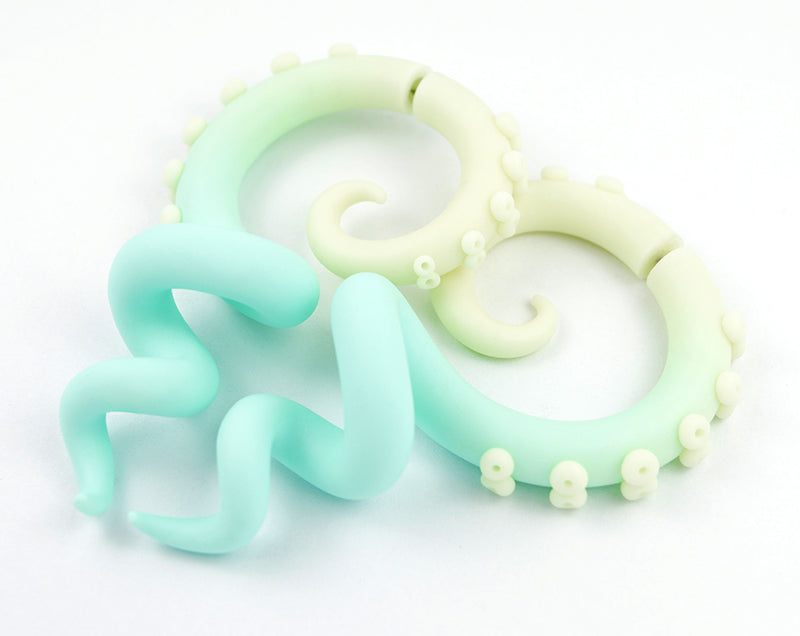 Glow in the dark earrings, handmade mint fake gauge earrings by Tania Chernova. Tentacle earrings and tentacle gauges / tentacle plugs in 1 gauge, 0 gauge, 00 gauge, 000 gauge. Unique yami kawaii earrings, fairy kei octopus earrings. Pastel goth earrings of polymer clay, custom jewelry online store. Kpop pastel earrings. Light yellow (glow in the dark) - mint octopus tentacle earrings with glow dots (suction cups).