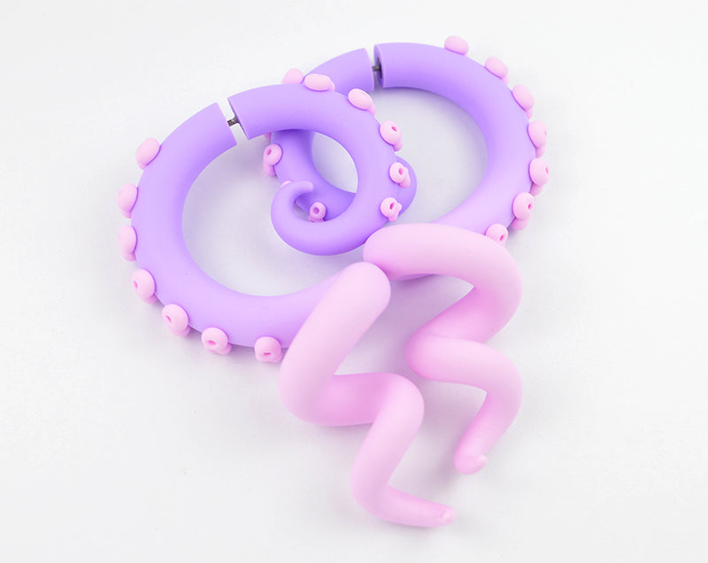 Light purple light pink pastel goth earrings fairy kei tentacle earrings yami kawaii tentacle gauges by Tania Chernova. Unique Sweet Lolita fashion octopus earrings, fake gauge earrings and true tentacle gauges in 1g 0g 00g 000g. Customizable aesthetic earrings. Unique fake body jewelry by Tania Chernova, Kpop earrings.