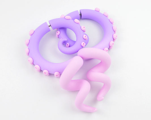 Light purple light pink pastel goth earrings fairy kei tentacle earrings yami kawaii tentacle gauges by Tania Chernova. Unique Sweet Lolita fashion octopus earrings, fake gauge earrings and true tentacle gauges in 1g 0g 00g 000g. Customizable aesthetic earrings. Unique fake body jewelry by Tania Chernova, Kpop earrings.