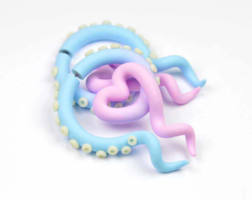 Pastel blue and light pink ombre yami kawaii pastel goth tentacle earrings, kpop and Sweet Lolita style inspired fake tentacle gauges by Tania Chernova. I can also make tentacle gauges for gauged earlobes, octopus gauges.