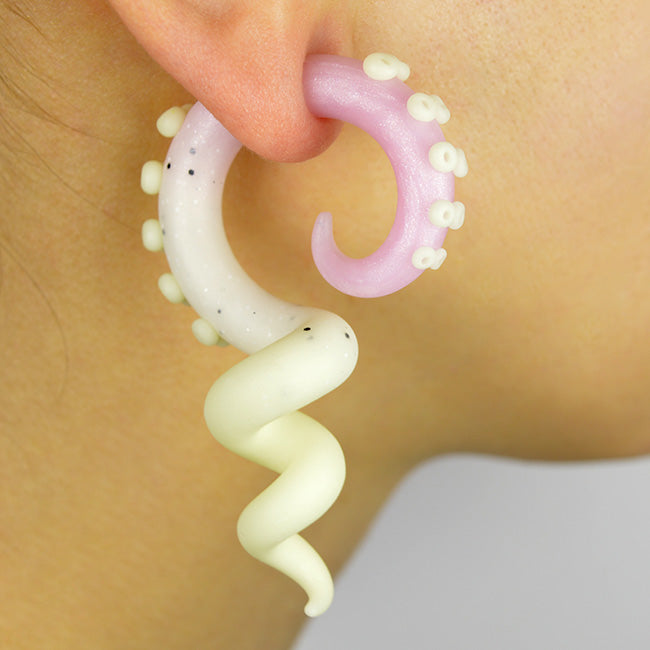 To make these octopus tentacle earrings, I used rose quartz crystal white marble and glow in the dark polymer clay. Glow in the dark earrings or nightglow earrings are glowing if they were previously near a light source. You may like these octopus earrings if you are looking for rose quartz earrings rose quartz bracelets rose quartz necklaces rose quartz jewellery etc. Handmade body jewelry by Tania Chernova.