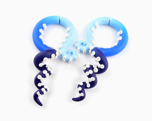 I made these octopus tentacle earrings with light blue and navy blue ombre. Unique fake gauge earrings and ear stretcher by Tania Chernova. Real and fake tentacle gauges perfect for octopus lovers and not only. If you like unique earrings, then you will definitely like my handmade products.