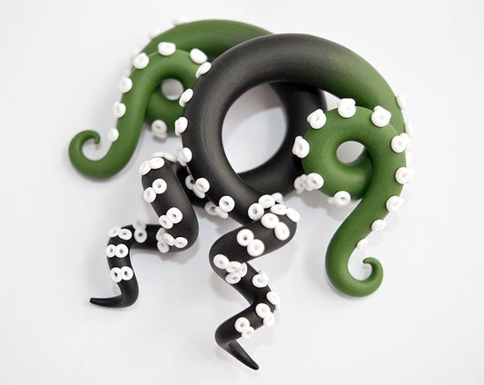 I made these tentacle gauges in 00g plugs 00g ear gauges for 00g stretched ears. You can choose stud earrings or your size of gauged earlobes. I made these 00g gauges with khaki green and black ombre and white suction cups.