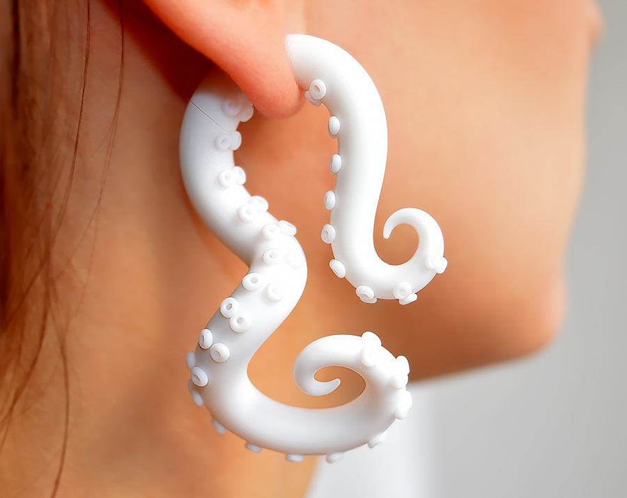 Unique white octopus tentacle earrings that will match with any sweet lolita fashion, pastel goth and yami kawaii fashion accessories of white colour. Octopus earrings can be worn with white yami kawaii clothing, white kawaii pastel goth lolita clothes. I can make tentacle earrings in both types, fake gauge earrings and real ear gauges.