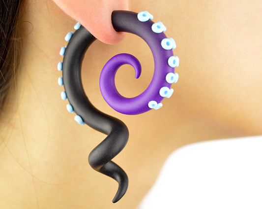 Handmade ursula little mermaid sea witch octopus tentacle earrings by Tania Chernova. Black and purple ombre octopus tentacles with light blue suction cups. Tentacle gauges and fake gauge earrings.