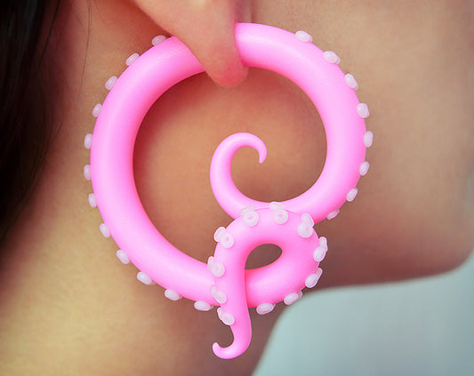 Handmade kraken earrings by Tania Chernova, unique octopus tentacle earrings, fake ear gauges / faux plugs and real ear gauges / actual ear gauges / true ear gauges. Light pink pastel goth earrings, fairy kei yami kawaii fashion. Octopus earrings that look like octopus tentacles.