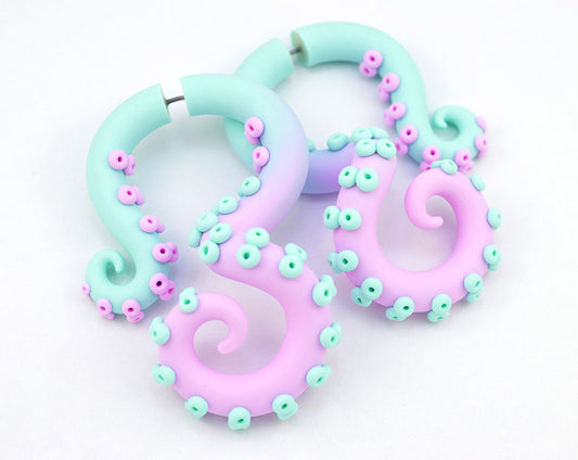 I made these octopus tentacle earrings with mint and light pink pastel ombre. These octopus earrings can be made as ear gauges and as fake gauges. Unique handmade body jewelry by Tania Chernova. Tentacle gauges can be made in 2g 1g 0g 00g 000g 7/16" 0000g. Yami kawaii pastel goth earrings.