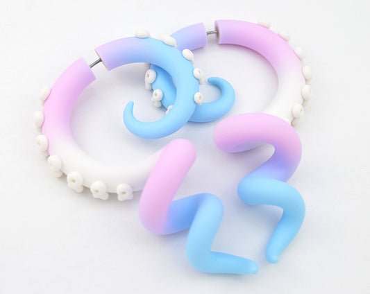 Unique handmade trans pride earrings pastel octopus tentacle earrings by Tania Chernova, transgender flag earrings. Pastel goth trans earrings, yami kawaii transgender earrings. LGBT pride month earrings gauges plugs tapers tunnels stretchers ear hangers. Trans fake gauge earrings. Tran earrings - light pink baby blue white baby blue light pink.