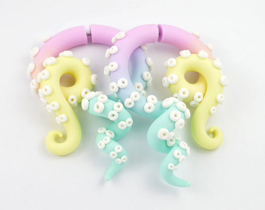 I made these pastel goth tentacle earrings with my favorite pastel colors - vanilla light yellow light pink mint green. I was inspired by yami kawaii fashion, Sweet Lolita fashion and fairy kei fashion. If you are looking for pastel goth shop or pastel goth clothing so you should definitely take a look at pastel goth accessories I make. Kpop kawaii earrings by Tania Chernova. Faux fake gauge earrings like stud earrings and ear stretchers for gauged earlobes.