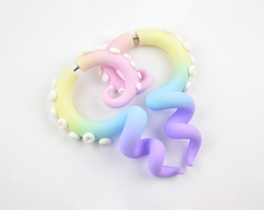 Pastel aesthetic earrings, tentacle earrings by Tania Chernova. Pastel goth yami kawaii style fake gauge earrings and real actual true gauges in 1g 0g 00g 000g. Pastel rainbow earrings.