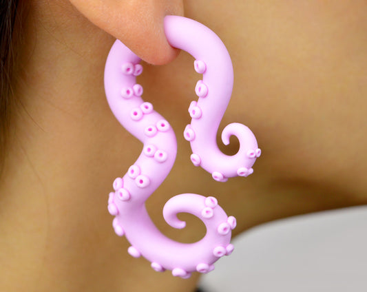 Pink sweet lolita fashion earrings or pastel pink goth aesthetic tentacle earrings by Tania Chernova. Unique handmade octopus earrings in yami kawaii fashion colors. Pink goth earrings in octopus style. Menhera kei kpop fairy kei light pink earrings. Pastel goth aesthetic earrings, pastel pink fake gauge earrings.