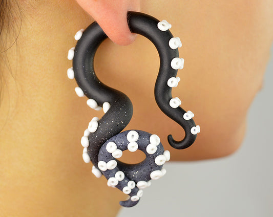 Handmade creepy jewelry, octopus tentacle earrings by Tania Chernova, fake gauges and real ear gauges. Black and glitter granite with white dots. Tentacle goth gauges octopus gothic gauges body jewelry goth earrings.