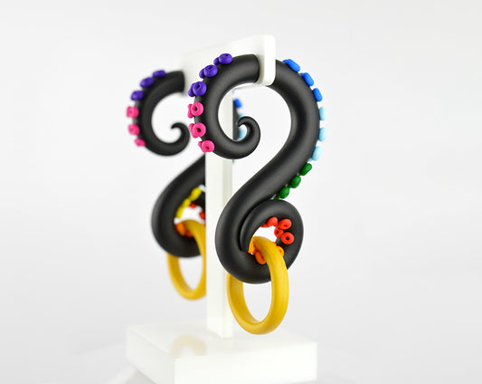 Black tentacle earrings with rainbow suction cups, unique octopus earrings, octopus keeps ring.