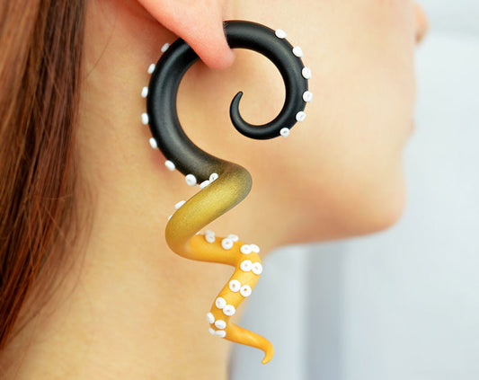 I made these tentacle earrings with black and gold ombre. I make both stud earrings / octopus earrings and tentacle gauges / tentacle plugs.