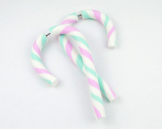 I made these candy cane earrings with yami kawaii colors, light green white light pink stripes. Handmade christmas earrings by Tania Chernova, fake gauge earrings and candy cane gauges.
