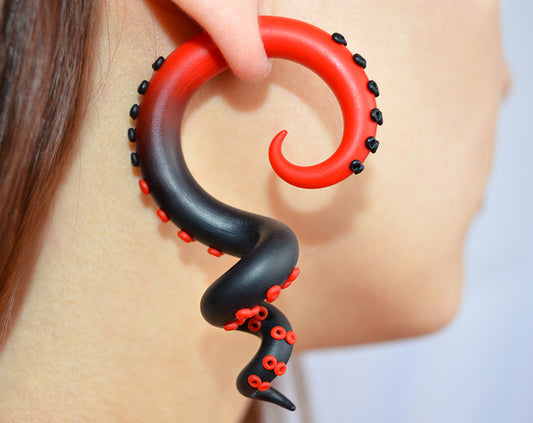 I was inspired to create these tentacle earrings by Queen of Hearts. These octopus earrings feature a black to red ombre design and are reminiscent of vampire earrings. I make both options fake gauge earrings and tentacle gauges. Tentacle ear gauges available in 2 gauge 1 gauge 0 gauge 00 gauge 000 gauge 7/16 inch 0000 gauge. Red and black vampire earrings go well with vampire costume women vampire halloween costume dracula costume vampire outfit for vampire cosplay red and black hair