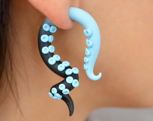 Unique handmade light blue and black pastel goth octopus tentacle earrings by Tania Chernova. I make both fake gauge earrings (stud earrings) and real ear gauges (for gauged ears). Cute yami kawaii pastel earrings, kpop menhera kei earrings, fairy kei fashion style. Aesthetic handmade earrings.