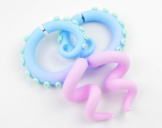 Yami kawaii pastel goth tentacle earrings with light blue and light pink ombre and light green (peppermint). I can make these octopus pastel goth earrings as fake ear gauges and real ear gauges for gauged earlobes.