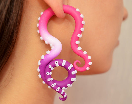 Custom earrings with magenta pink glitter white and purple ombre.