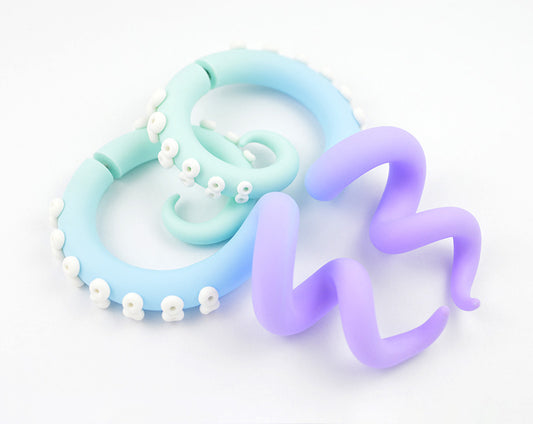 When creating these octopus tentacle earrings, I used light green (mint) light blue (aqua) and light purple (lavender) colors, and also white for suction cups. I can make these pastel goth earrings as fake gauges (tentacle stud earrings) and as real ear gauges (tentacle gauges for gauged earlobes).