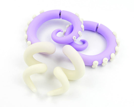 Kawaii pastel goth earrings with light purple and night glow ombre, handmade tentacle earrings by Tania Chernova.