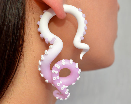 I made these tentacle earrings with white to rose quartz ombre. Pastel goth subculture inspired me to create tentacle gauges with such an amazingly delicate color combination. I can make octopus earrings in both fake gauge earrings and real ear plugs. Handcrafted body jewelry by Tania Chernova.