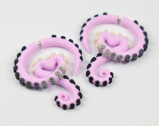 I made these pink goth aesthetic earrings with light pink base and ombre dots with glitter black and glow in the dark. Yami kawaii aesthetic tentacle earrings cool for pink goth outfit or just for lovers of pink goth fashion. I make both pink aesthetic earrings that look like gauges and real ear gauges.