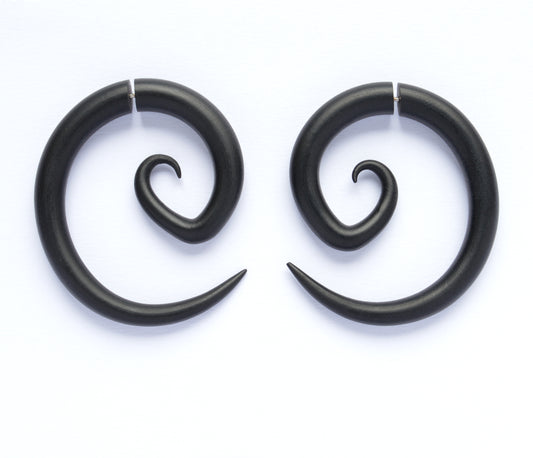 I make these spiral earrings in two versions - spiral fake gauge earrings (earrings that look like gauges) and real spiral gauges (for gauged earlobes)