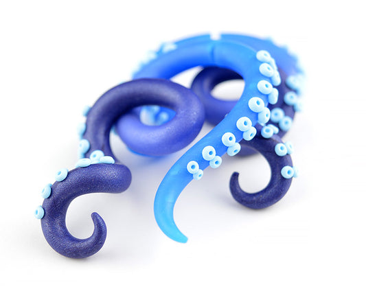 I made these tentacle earrings / tentacle gauges with translucent blue and shimmer blue ombre. Octopus earrings by Tania Chernova.